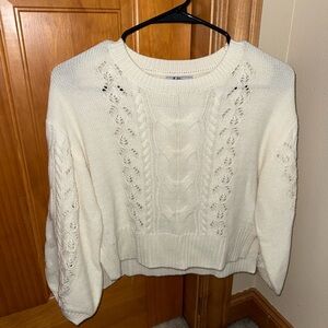 Chic Cream Sweater with Intricate Knit Design